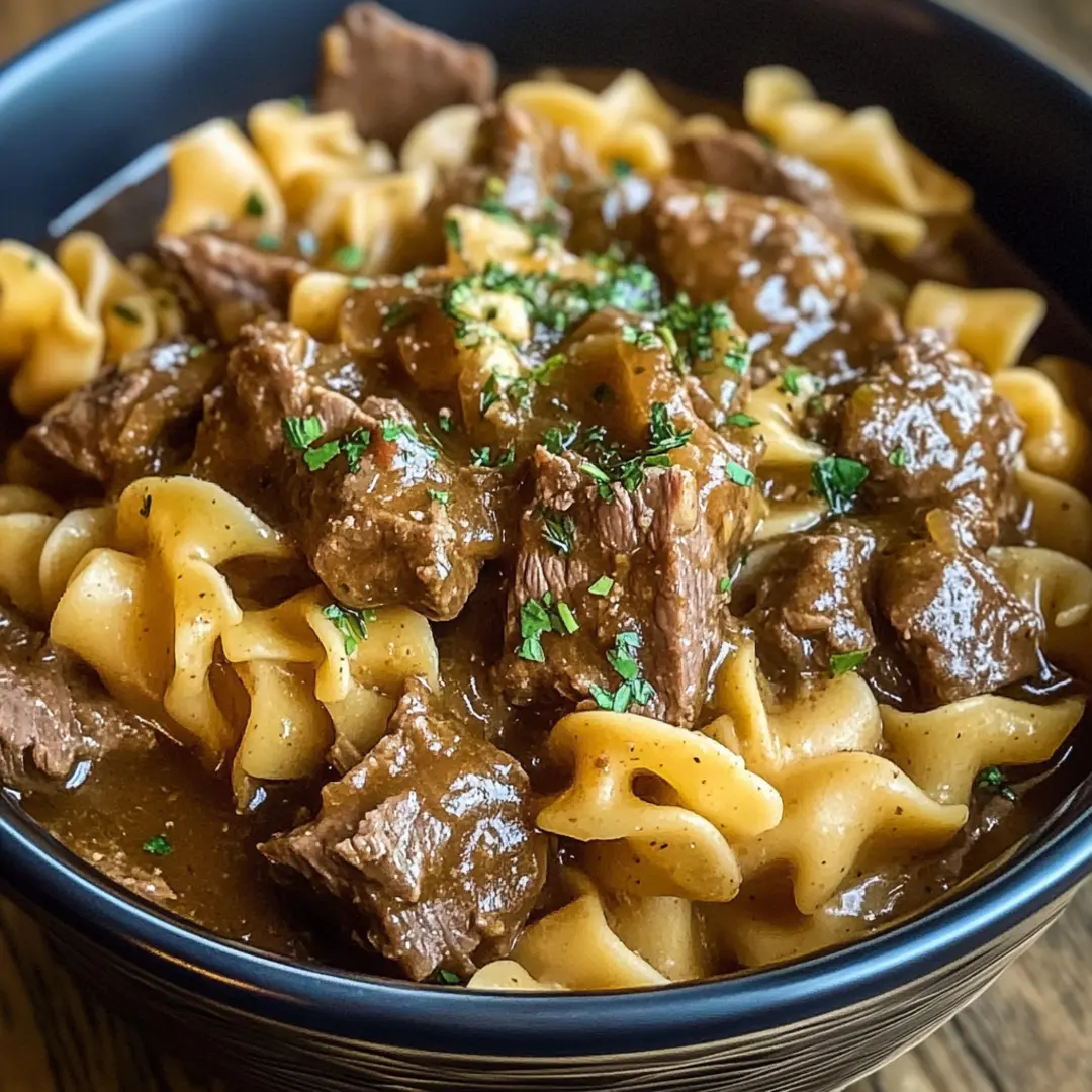 Hearty crockpot beef and noodles in a rich, savory gravy.